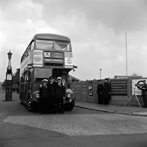 London Transport Double Decker bus and crew seen here at the Chiswick bus garage