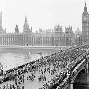 London victory march. Passing over Westminster Bridge with the Houses of Parliament in