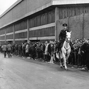 Long line of Liverpool fans queue up for tickets outside Anfield stadium
