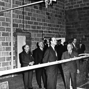 Looking around the gymnasium, Prince Philip, Duke of Edinburgh shares a joke with Looking around the gymnasium, Prince Philip, Duke of Edinburgh shares a joke with