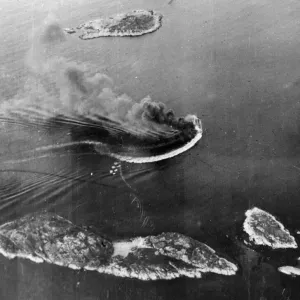 Looking down on Lodingen Harbour, Norway as an enemy aircraft tender circles out of Looking down on Lodingen Harbour, Norway as an enemy aircraft tender circles out of