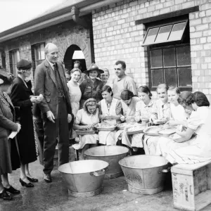 Lord and Lady Halifax seen here visiting a communal kitchen. Circa 1939 Lord and Lady Halifax seen here visiting a communal kitchen. Circa 1939