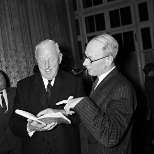 Lord Wolfenden (right) and Sir Stanley Rous of the Football Association meet members of