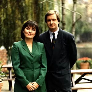 Lorraine Kelly television presenter green jacket grey skirt
