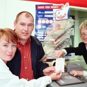 Lottery Winners Mark and Cheryl Brudenell Buy Ticket Print (July 1997) Lottery Winners Mark and Cheryl Brudenell Buy Ticket Print (July 1997)