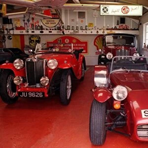 Lotus and MGTA cars in garage March 1999