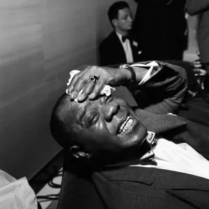 Louis Armstrong at a Press Conference at the Mayfair Hotel, London Louis Armstrong at a Press Conference at the Mayfair Hotel, London