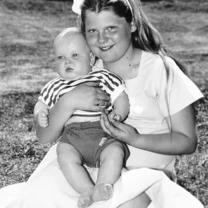 Louise Brown Test Tube Girl holding 6 month old Andrew Machea on her lap May 1989 Louise Brown Test Tube Girl holding 6 month old Andrew Machea on her lap May 1989