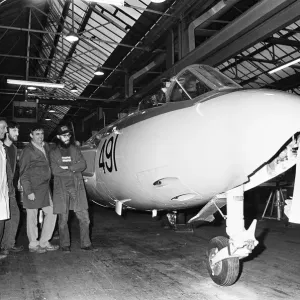 A lovingly restored Seahawk Hawker jet fighter is checked over by workers at the city A lovingly restored Seahawk Hawker jet fighter is checked over by workers at the city