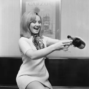 Lulu, pictured at her London flat celebrating after she has learnt that her single To Sir Lulu, pictured at her London flat celebrating after she has learnt that her single To Sir