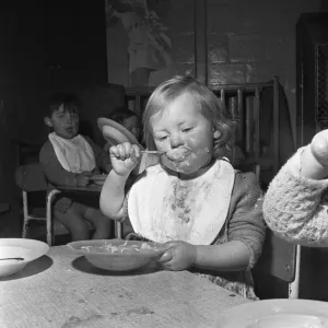 Lunch time at the L. C. C. Day nursery in Regency Street, Victoria