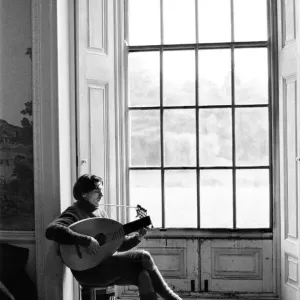 A lute player rehearses during a break in filming of Peter Halls A lute player rehearses during a break in filming of Peter Halls
