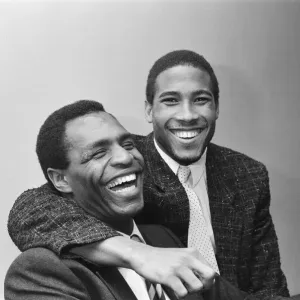 Luther Blissett, (left, in striped tie) and John Barnes (right Luther Blissett, (left, in striped tie) and John Barnes (right