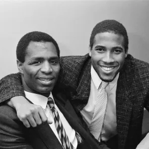 Luther Blissett, (left, in striped tie) and John Barnes (right Luther Blissett, (left, in striped tie) and John Barnes (right