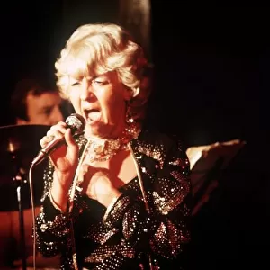 Lynne Perrie Actress singing on stage