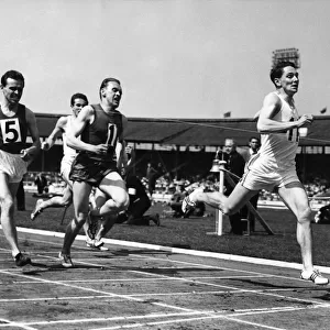 M. A. Rawson of Great Britain winning the 880 yds international, from K. H