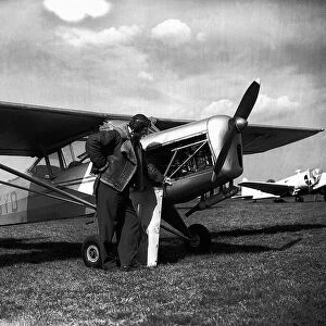 Mad Major Christopher Draper with his Auster aircraft. May 1950