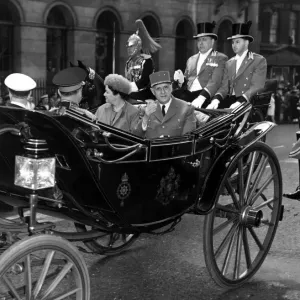 Madame and President Charles De Gaulle - April 1960 acknowledge the crowds cheers