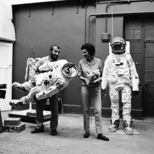 Madame Tussauds staff put the finishing touches to waxwork models of astronauts Neil
