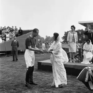 The Maharani of Jaipur presents Prince Philip, Duke of Edinburgh with the Victoria Cup The Maharani of Jaipur presents Prince Philip, Duke of Edinburgh with the Victoria Cup