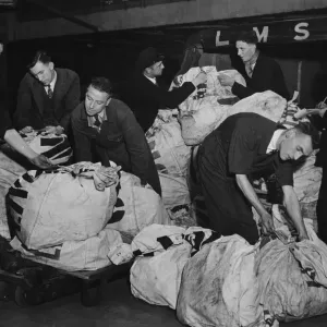 Mail bags being received and checked in at the headquarters of Unity Football Pools in Mail bags being received and checked in at the headquarters of Unity Football Pools in