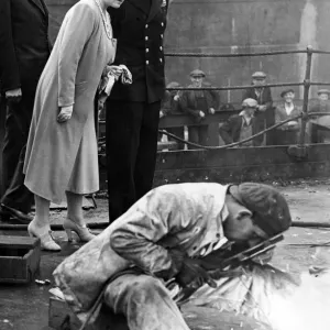Their Majesties King George VI and Queen Elizabeth watch a welding process in a Tyneside Their Majesties King George VI and Queen Elizabeth watch a welding process in a Tyneside