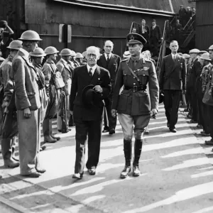 His Majesty King George VI walks through guard of honour formed by ARP wardens during his His Majesty King George VI walks through guard of honour formed by ARP wardens during his