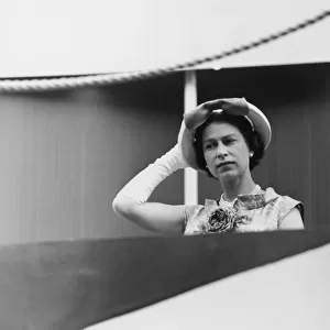 Her Majesty Queen Elizabeth II holding her hat during the Royal tour of Canada