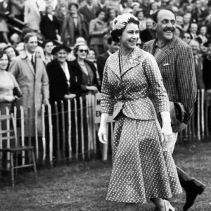 Her Majesty Queen Elizabeth II smiles after making a presentation to the Argentina polo Her Majesty Queen Elizabeth II smiles after making a presentation to the Argentina polo