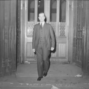 Major John Freeman Under Secretary of State for War leaving Houses of Parliament after