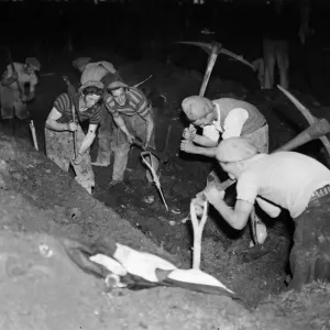 Making dug outs in Shepherds Bush, West London. Picture taken 5th March 1946 Making dug outs in Shepherds Bush, West London. Picture taken 5th March 1946