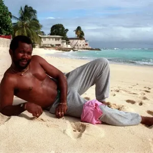 Malcolm Marshall West Indies cricketer relaxes on a sandy beach in Barbados 5th February Malcolm Marshall West Indies cricketer relaxes on a sandy beach in Barbados 5th February