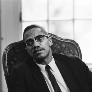 Malcolm X, African American Muslim minister and human rights activist, at a London Mosque Malcolm X, African American Muslim minister and human rights activist, at a London Mosque