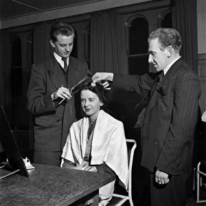 Male apprentices learn ladies hairdressing. March 1952 C1272-002