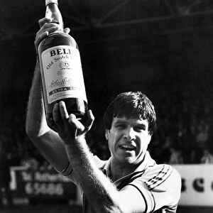 Man of the month - Emlyn Hughes picks up a gallon of scotch while his former mates