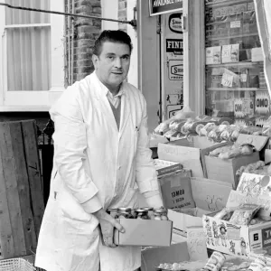 A man sitting in his shop at Deptford. November 1969 Z10715-001 A man sitting in his shop at Deptford. November 1969 Z10715-001