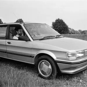 A man and woman in a MG Maestro. 8th June 1983 A man and woman in a MG Maestro. 8th June 1983