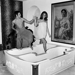 Man and woman sharing a bath. November 1969 Z10586-003
