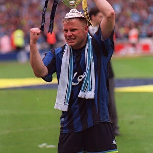 Manchester City captain Andy Morrison May 1999 celebrates with trophy