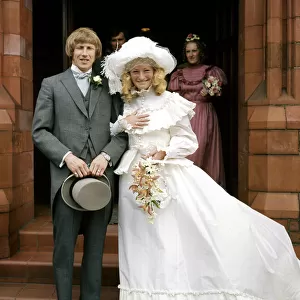 Manchester City footballer Colin Bell with his bride Marie Holmes after their wedding at