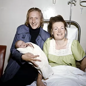 Manchester City footballer Denis Law pictured at home with his wife