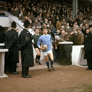 Manchester City footballer John Crosson walks out of the tunnel onto the pitch before his