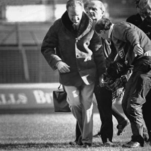 Manchester City player Paul Lake is stretchered off after being knocked unconscious by a
