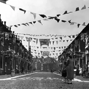 A Manchester street decked out with coronation decorations in celebration of A Manchester street decked out with coronation decorations in celebration of