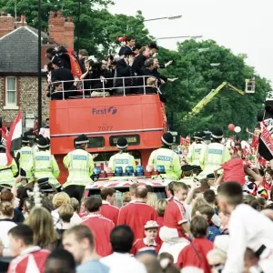Manchester United celebrate winning the treble as the jubilant team make their way Manchester United celebrate winning the treble as the jubilant team make their way