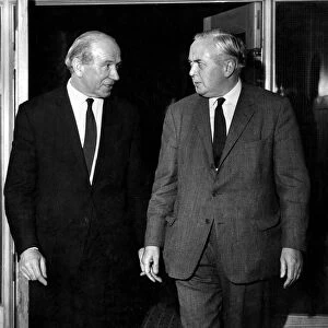 Manchester United football manager Matt Busby meets Prime Minister Harold Wilson for