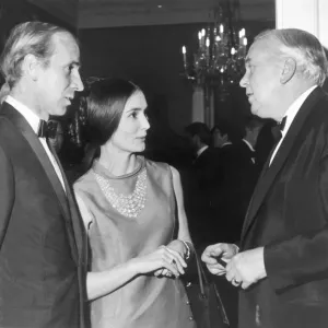 Manchester United footballer Bobby Charlton with his wife Norma talking to Prime Minister Manchester United footballer Bobby Charlton with his wife Norma talking to Prime Minister