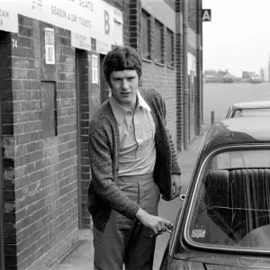 Manchester United footballer Brian Kidd leaves Old Trrfford training in his car following