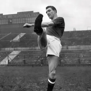 Manchester United footballer Bill Foulkes during a training session. March 1957