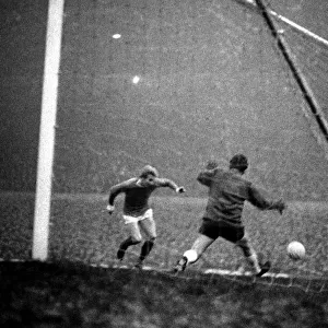Manchester United forward Denis Law scores the game
